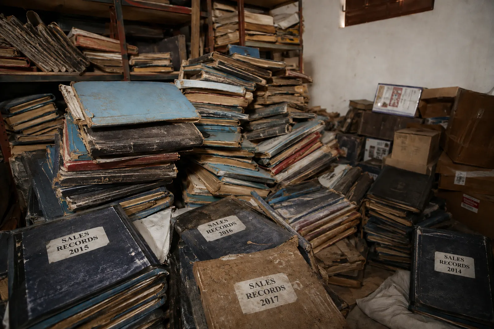 Stacks of old sales records and ledgers